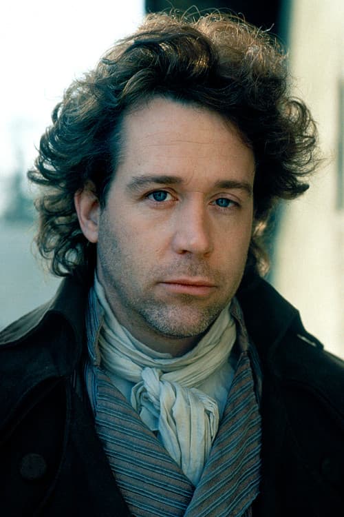 Tom Hulce headshot